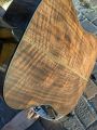 The back and sides are claro walnut from Sunriver, Oregon.